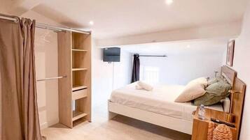 1 chambre, fer et planche Ă repasser, Wi-Fi, draps fournis