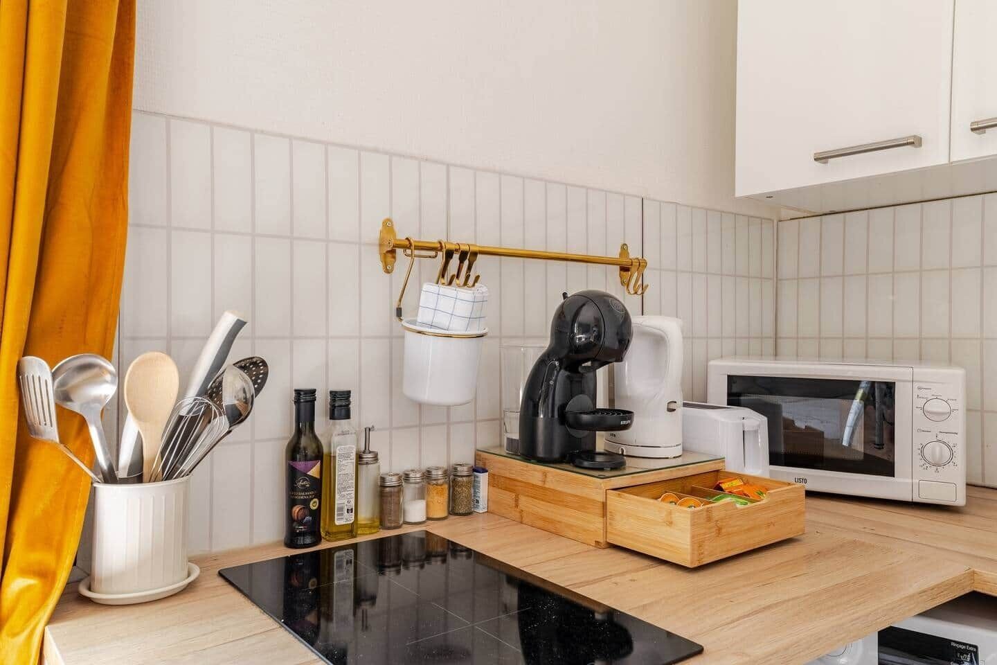 Fridge, microwave, toaster, cookware/dishes/utensils