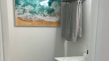 Hair dryer, towels, soap, toilet paper