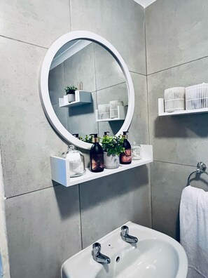 Hair dryer, towels, soap, shampoo
