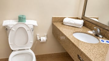 Combined shower/bathtub, towels, soap, shampoo