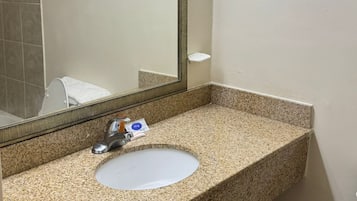 Combined shower/tub, towels, soap, shampoo