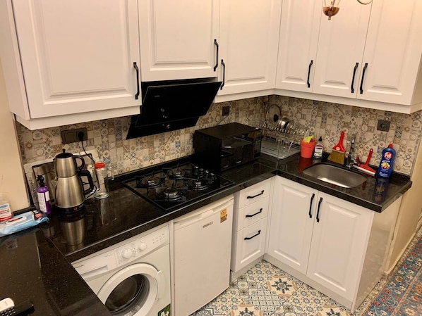 Microwave, stovetop, electric kettle, toaster