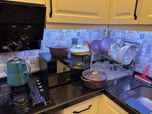 Microwave, stovetop, electric kettle, toaster