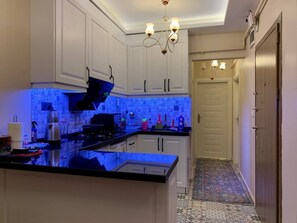 Microwave, stovetop, electric kettle, toaster