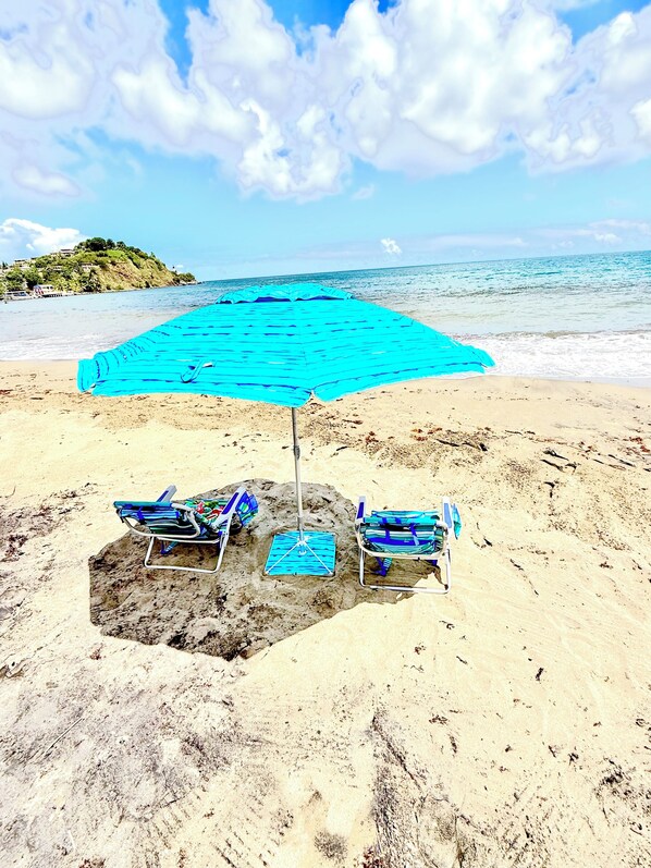 On the beach, sun-loungers, beach towels