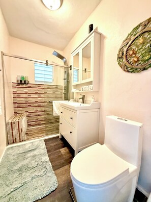 Shower, eco-friendly toiletries, hair dryer, bidet