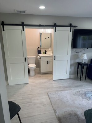 Hair dryer, towels, soap, toilet paper