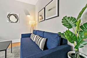 Superior Apartment, 2 Bedrooms | Living area | 55-inch TV with digital channels, streaming services