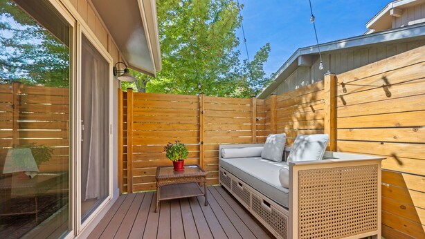 A wooden deck with a sofa and a small table with a plant. - 2-beds, 3 baths, 1 office, full kitchen townhome in beautiful Boulder, heat & AC (Boulder)
