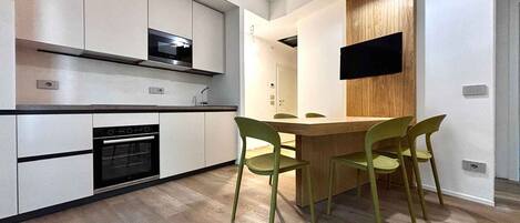 Microwave, stovetop, dishwasher, cookware/dishes/utensils