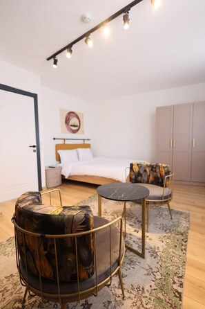 Standard Studio | Bathroom | Shower, hair dryer, slippers, towels