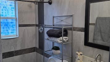 Hair dryer, towels, soap, toilet paper