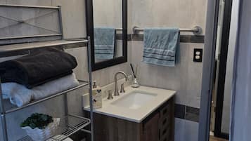 Hair dryer, towels, soap, toilet paper