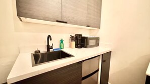 Fridge, microwave, coffee/tea maker, toaster