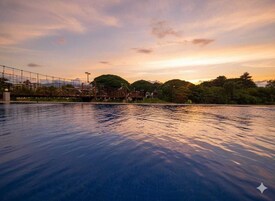 Outdoor pool, pool umbrellas, sun loungers