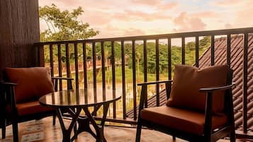 Deluxe Double Room, Garden View | Water view