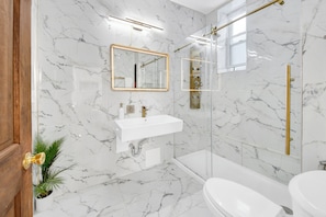 Hair dryer, bidet, towels, soap