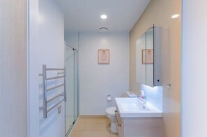 Shower, hair dryer, towels, soap