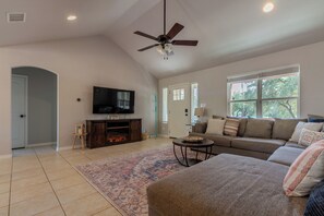 Smart TV, fireplace, books