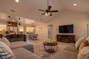 Smart TV, fireplace, books
