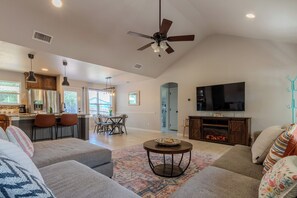 Smart TV, fireplace, books