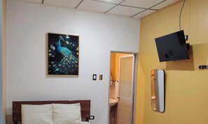 Double or Twin Room, City View | Desk, laptop workspace, soundproofing, iron/ironing board - EL ENCANTO HOTEL (Iquitos)