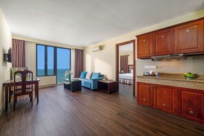 Deluxe Suite, Sea View | Living area | Flat-screen TV, Netflix, streaming services