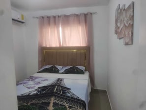 Basic Apartment | Blackout drapes, iron/ironing board