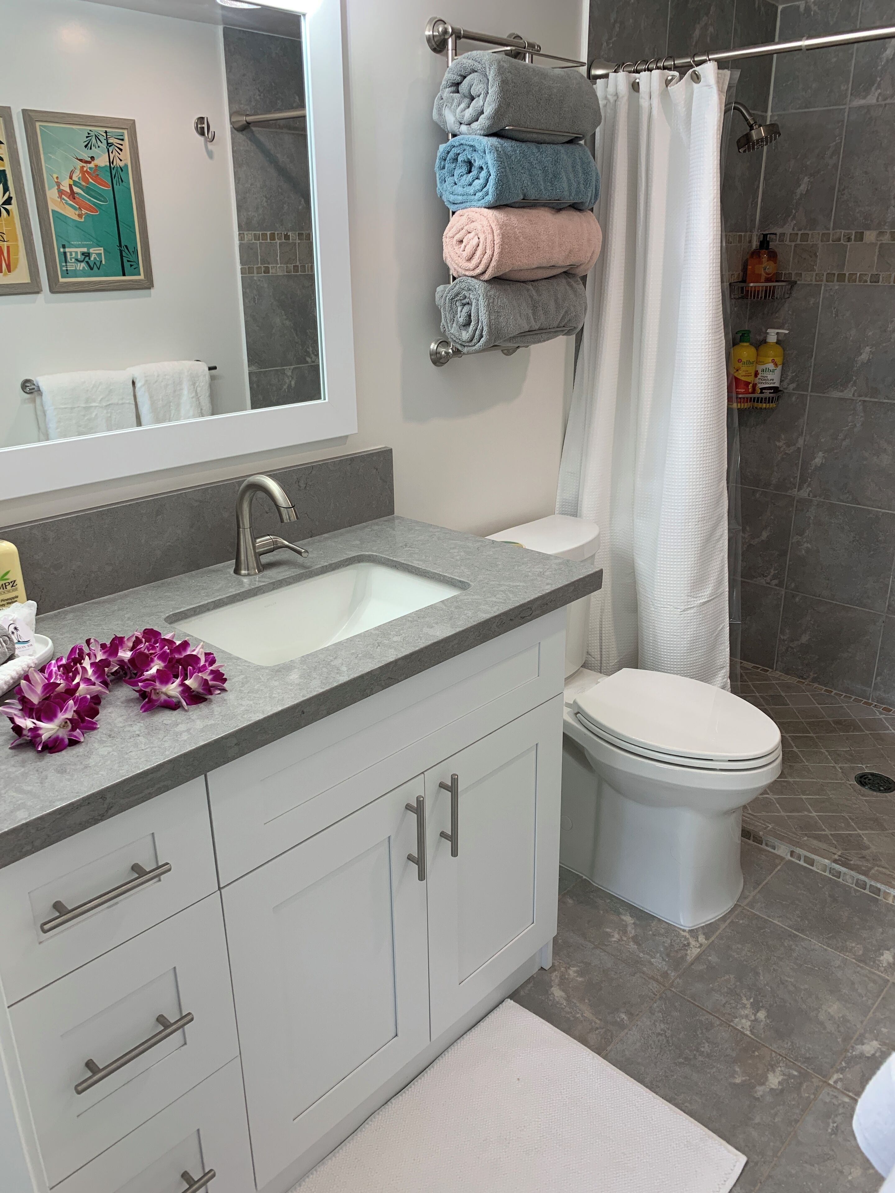 Shower, hair dryer, towels, soap