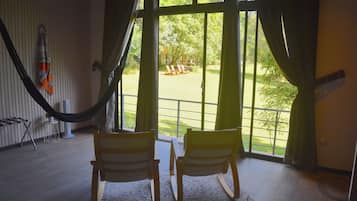 Deluxe Quadruple Room, Garden View | In-room safe, blackout drapes, free WiFi