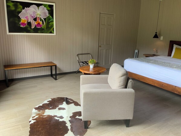 Deluxe Triple Room, Garden View | In-room safe, blackout drapes, free WiFi