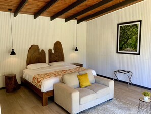 Kamar Single Deluks, pemandangan kebun | Brankas, tirai kedap cahaya, dan Wi-Fi gratis