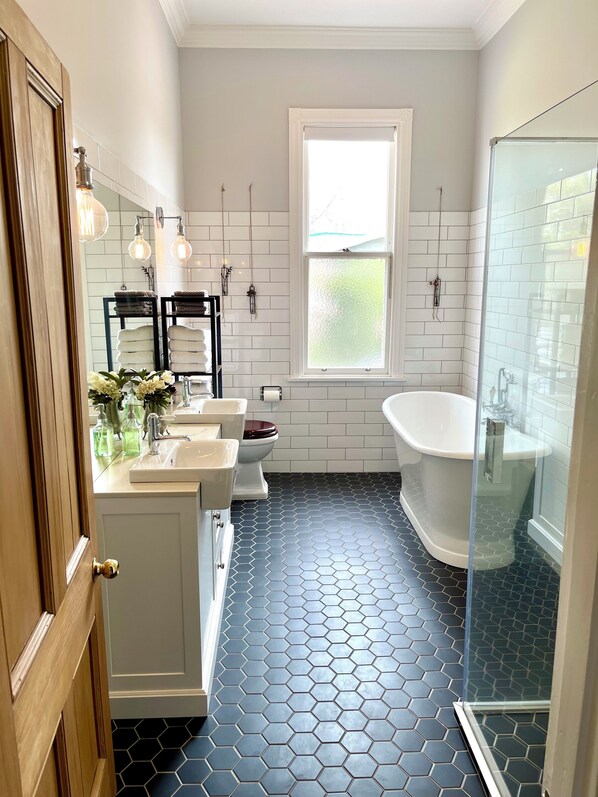 Shower, hair dryer, towels, soap