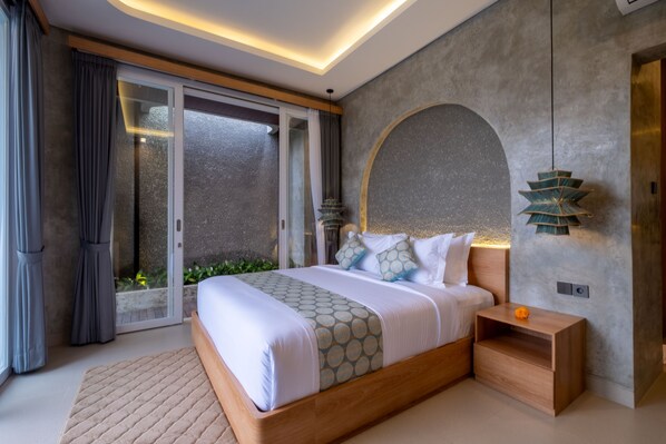 Deluxe Villa, Balcony, Pool View | In-room safe, desk, laptop workspace, iron/ironing board