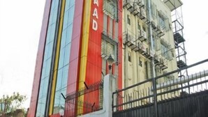 A multi-story hotel building with a prominent vertical sign reading "HOTEL SAAD". - Hotel Saad (Kolkata)