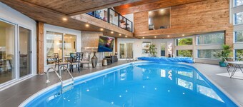 Indoor Heated Pool• Outdoor Hot Tub • Sports Building• 15 acres Woodlands