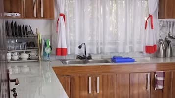 Family Bungalow, Garden View | Private kitchen | Fridge, microwave, cookware/dishes/utensils