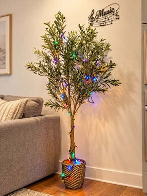 Tree corner with lights for a festival mood.