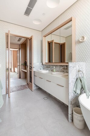 Shower, hair dryer, towels, soap