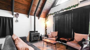 Family Bungalow, Air conditioning, Mountain View | Living area | 45-inch Smart TV with digital channels