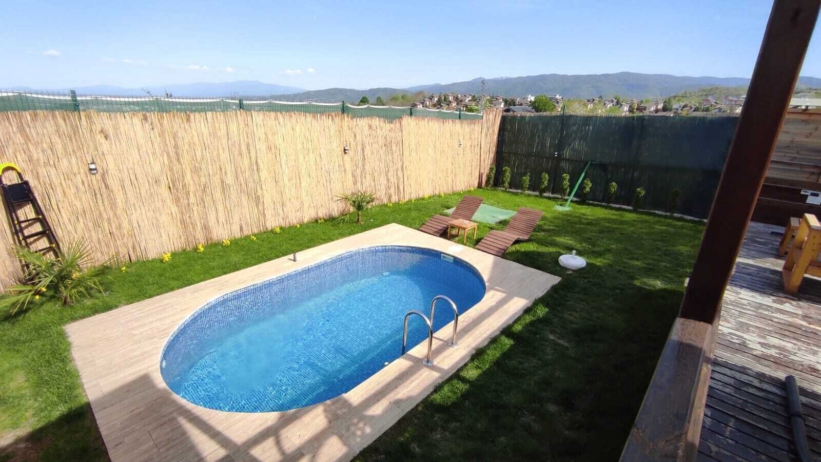 Outdoor pool, pool umbrellas, pool loungers