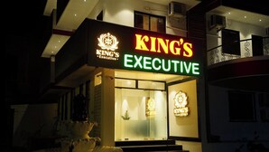 A building with a sign reading "KING'S Executive". - Kings Executive (Tuljapur)