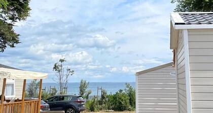 Vue mer, Location mobil-home, 3 chambres, terrasse.