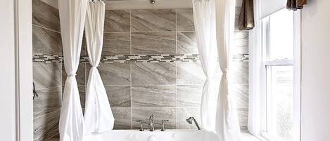 Jetted bath, hair dryer, towels, soap