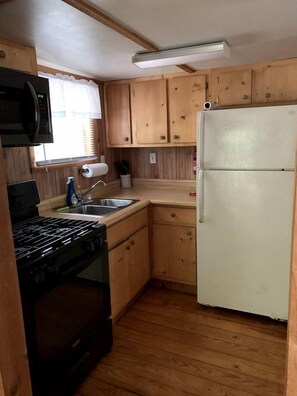 Fridge, microwave, dining tables