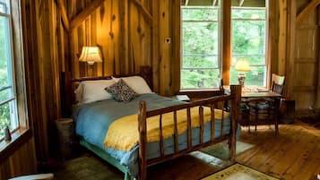 1 habitación, tabla de planchar con plancha y ropa de cama