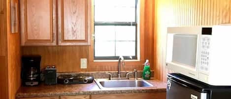 Fridge, microwave, stovetop, coffee/tea maker