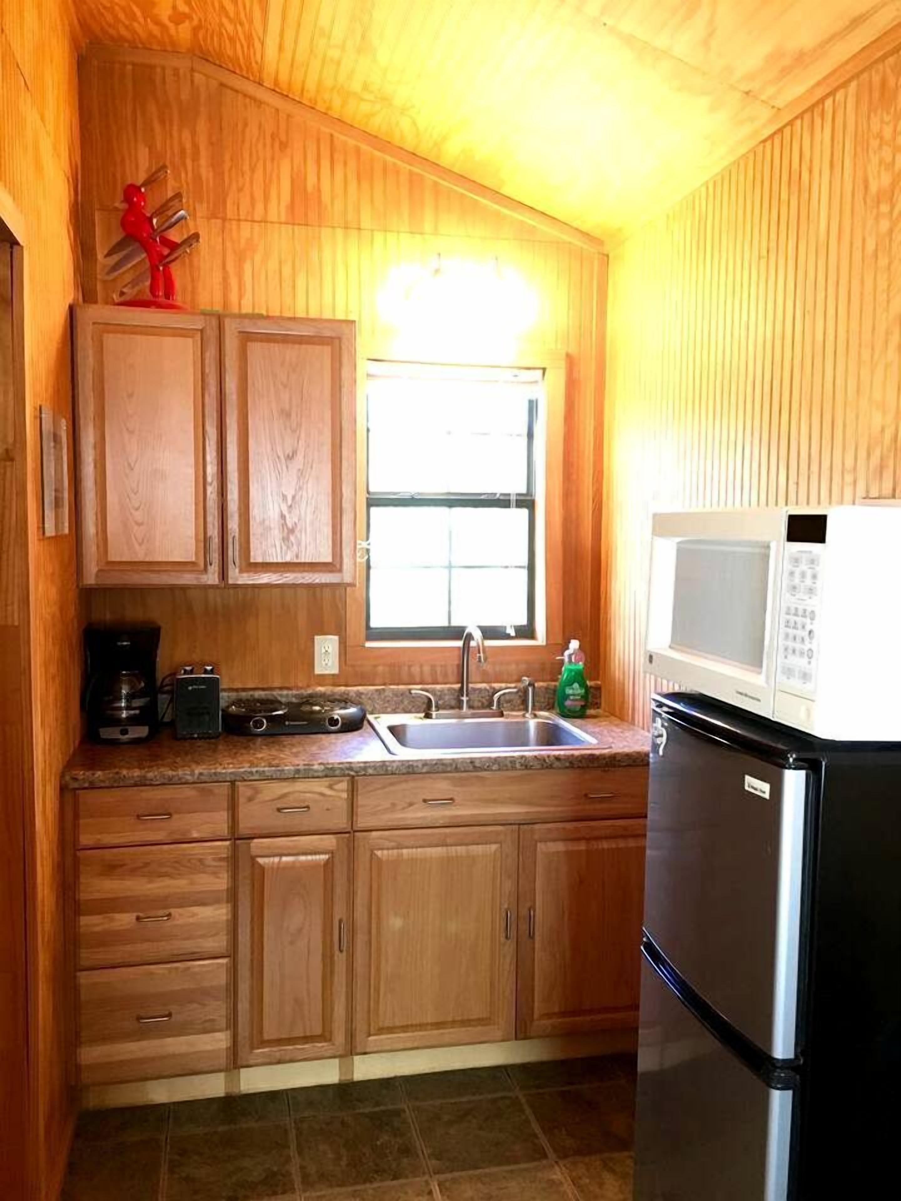 Fridge, microwave, stovetop, coffee/tea maker