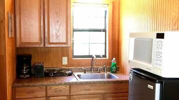 Fridge, microwave, stovetop, coffee/tea maker